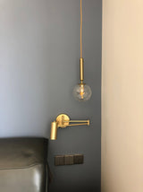 Zwenkarm Wandlamp - Stralend thuis Amsterdam